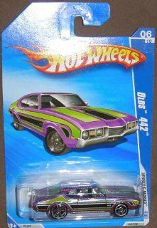 HOT WHEELS 06/10 '09 MUSCLE MANIA OLDS 442 PURPLE AND GREEN 082/190: Toys & Games