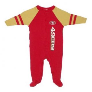NFL San Francisco 49ers Baby / Infant Comfortable Fit One Piece Footed Long Sleeve Bodysuit / Romper / Onesie   Red Yellow (Size 6 9 ) Clothing