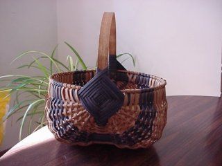 Amish Hand Woven Egg Basket 20" X 18". This Traditional Basket Has Also Been Called Buttocks Egg Basket, Fanny Basket, Peanut Basket, Gizzard Basket, Bow Basket and Melon Basket. The Design of This Unique Basket Will Transform an Ordinary Room In