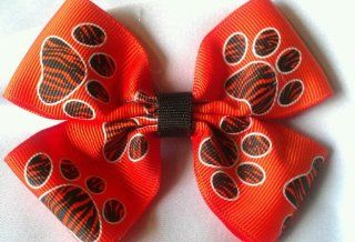 Bow   Orange Black Zebra Paw Print   3 Inch Double Boutique Bow   On Alligator Clip     Check Out My Other Items   Great for School or Party Favors, SHOW YOUR TEAM SPIRIT !! ***** Also Available in Bow Key Chain **** Different Colors Available : Other Prod