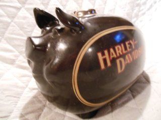 Harley Davidson Hog Bank. The popularity of this ceramic bank is legendary. A true Hog Piggy Bank. Black glazed bank features a two tone tank decal. Approximately 11" long x 7" high, 99400 82Z 