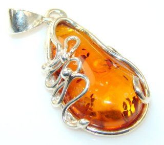 Amber Women Silver Pendant 5.90g (color: brown, dim.: 1 3/4, 5/8, 3/8 inch). Amber Crafted in 925 Sterling Silver only ONE pendant available   pendant entirely handmade by the most gifted artisans   one of a kind world wide item   FREE GIFT BOX: Pendant Ne