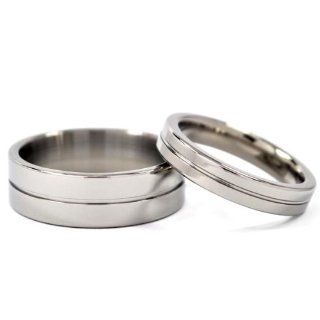 New His and Her's Matching Titanium Wedding Ring Set: Rumors Jewelry Company: Jewelry