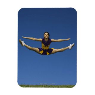 Female cheerleader jumping in air 3 flexible magnets