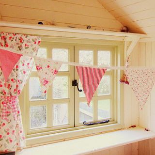 pink girls gingham and floral bunting by the fairground