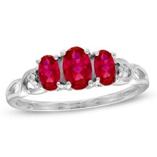 Oval Lab Created Ruby and Diamond Accent Three Stone Ring in 10K White