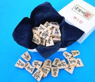 Diamond Lake Tung boxed and Carved boxwood chess pieces on special (japan import): Toys & Games