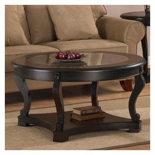 Geurts Espresso Coffee Table. This Dining Room Table Makes An Excellent Modern Furniture Piece Guaranteed. With A Smooth Espresso Finish, This Contemporary Glass Table Compliments Any Living Room Furniture Decor. A Small Round Table Of Elegance.  