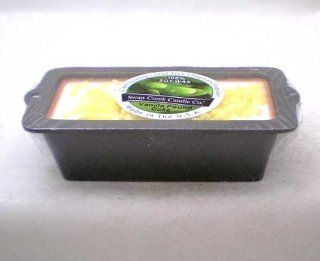 Swan Creek Vanilla Pound Cake Scented Candle in a Decorative Cast Iron Loaf Pan.  