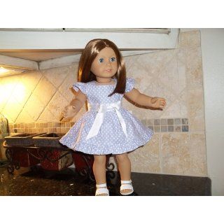 Doll Fashion Studio: Sew 20 Seasonal Outfits for Your 18 Inch Doll: Joan Hinds: 9781440230912: Books