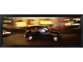 England, London, Black cab in the night by Panoramic Images Framed Art, Size 38 X 14